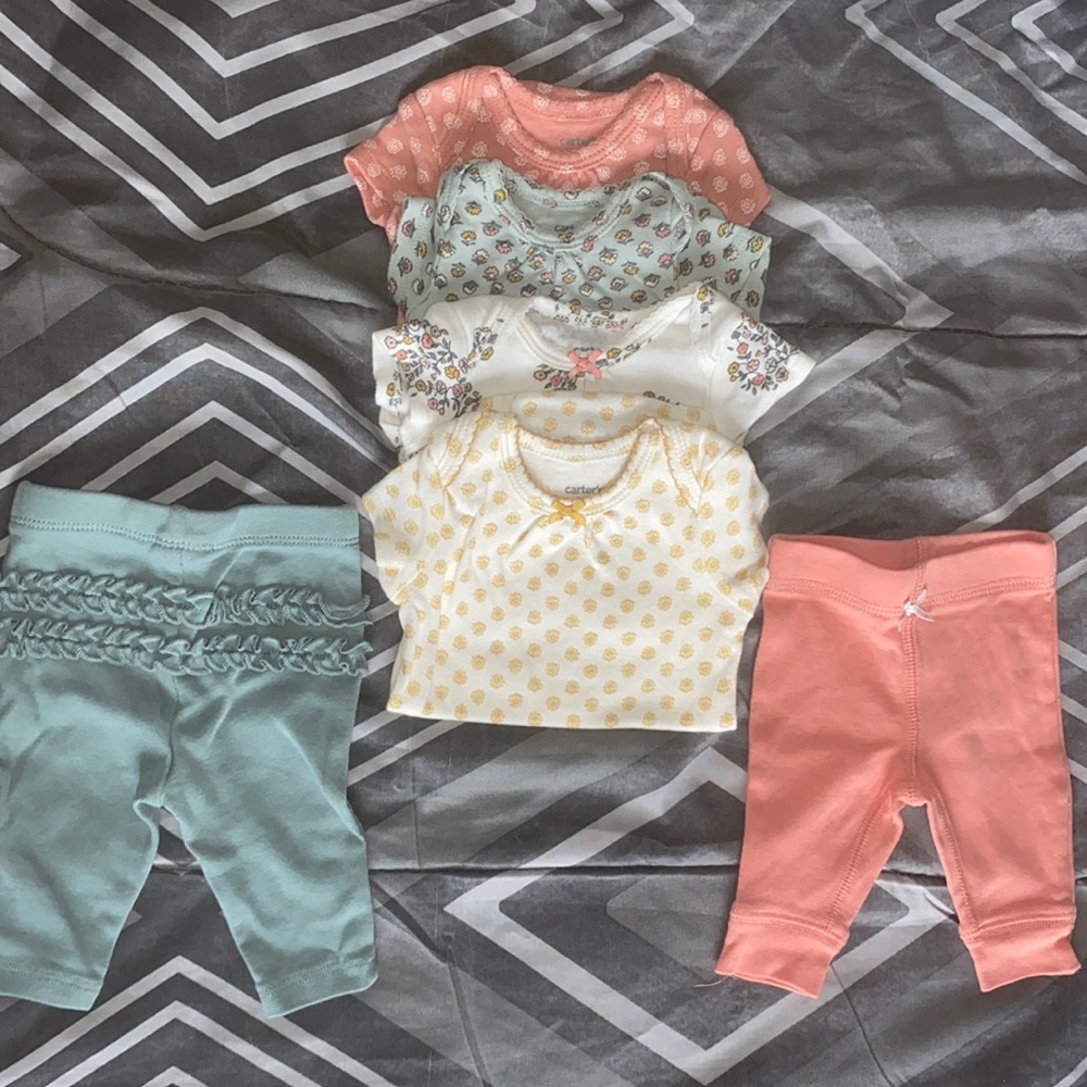 4 onesies and 2 pants
